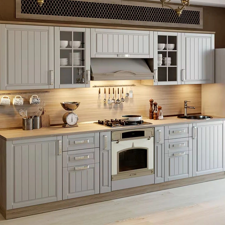 Light grey stainless steel cabinets with framed doors, open display units and gold-coloured handles, model SSC-06