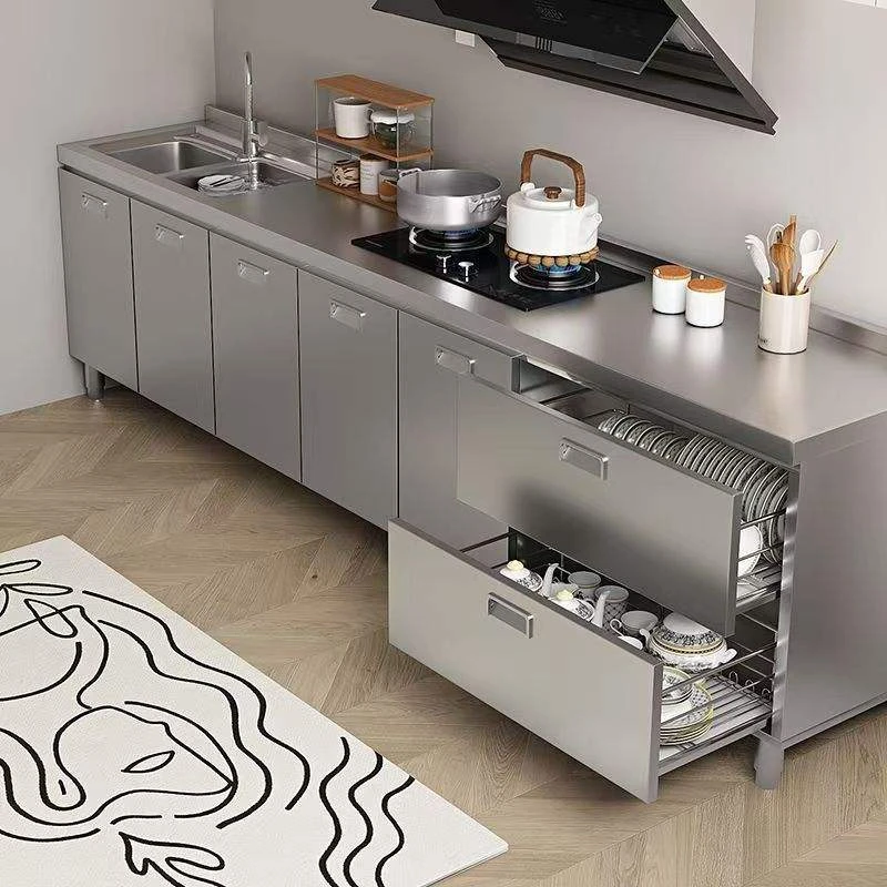 Grey stainless steel base cabinets with an open drawer and pull-out dish rack, model SSC-21