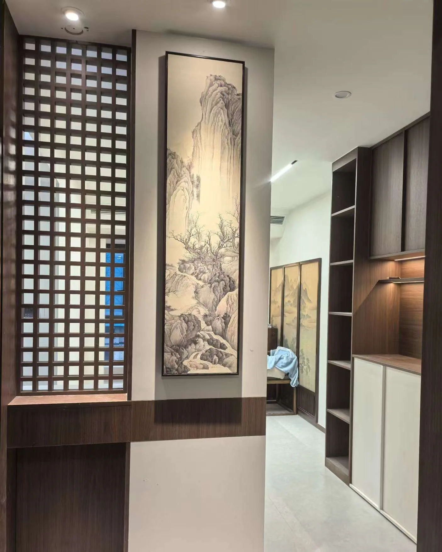 Floor-to-ceiling wood lattice partition used as an interior design reference