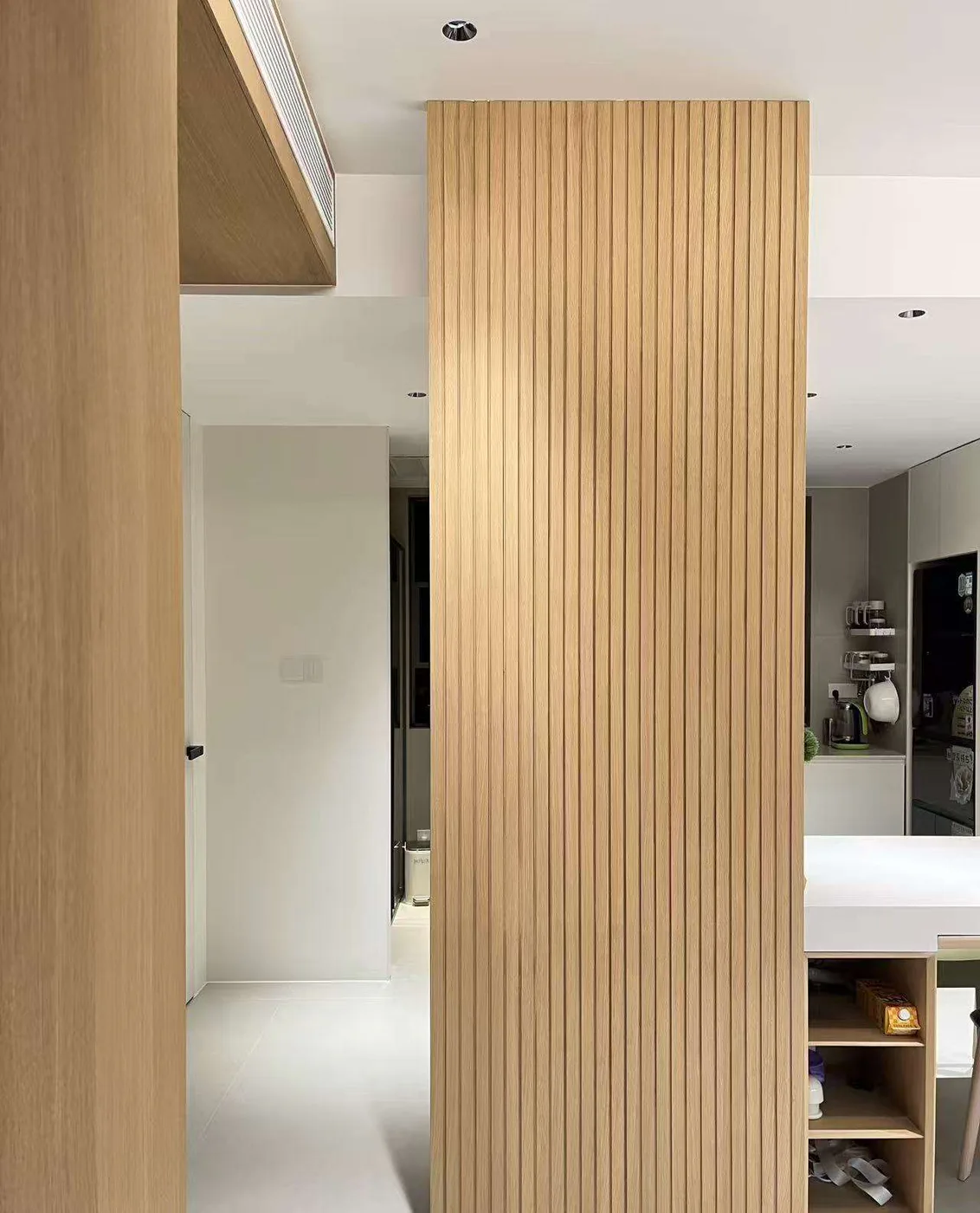 Wood wall panel system in a finished interior
