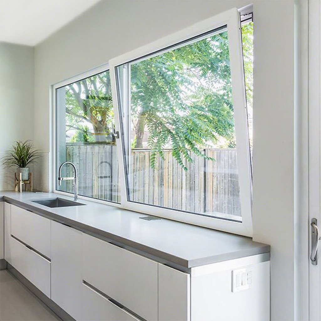 Aluminum window installation reference above a finished cabinet