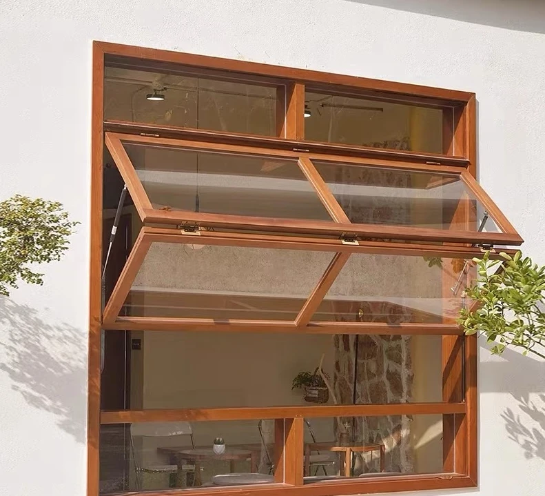Wood-tone window with two glazed sections folded outward between fixed upper and lower panes