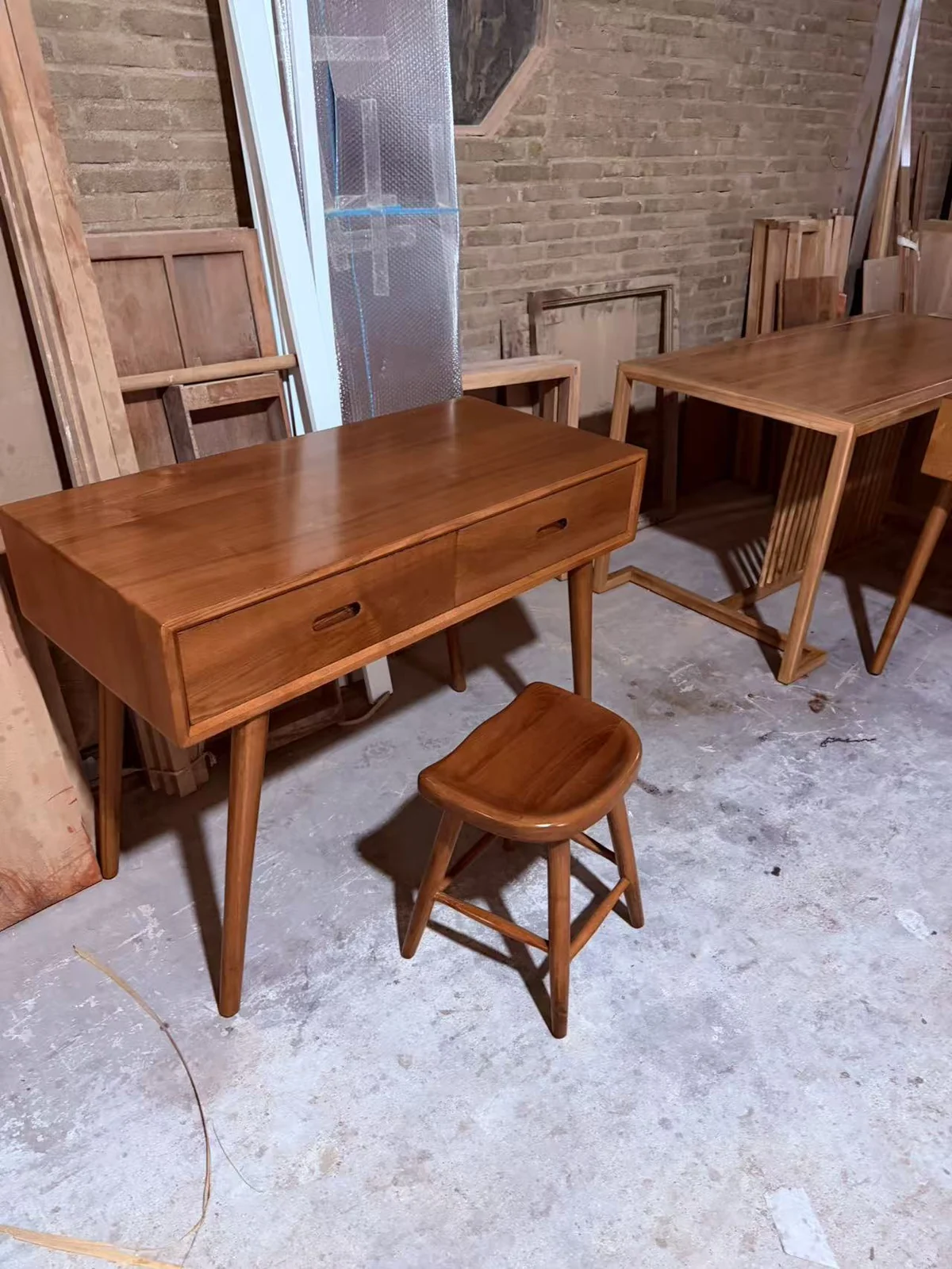 Tables with drawer fronts and a shaped stool from the Japan private villa furniture order